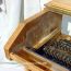 Hammond Model K Organ case with the manuals removed prior to restoration showing lacquer & sawdust
